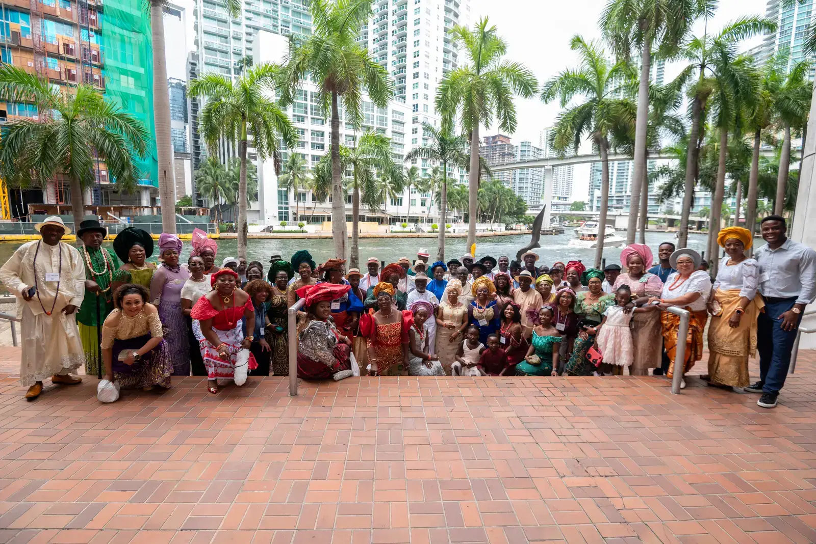 Members gathered for a group photograph on the Miami riverwalk, Convention 2025