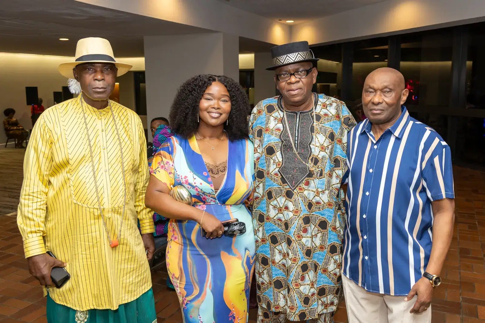 Four members smiling together at the welcome mixer, Convention 2025, Miami